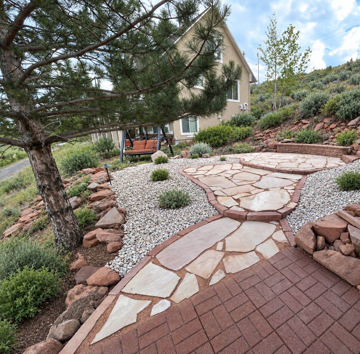 Completed stone pathway and patio on a mountain property